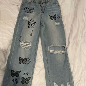 Blue Flare Jeans with Butterfly Design and Distressed Details